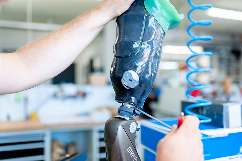 A close-up of a prosthetic leg in the workshop